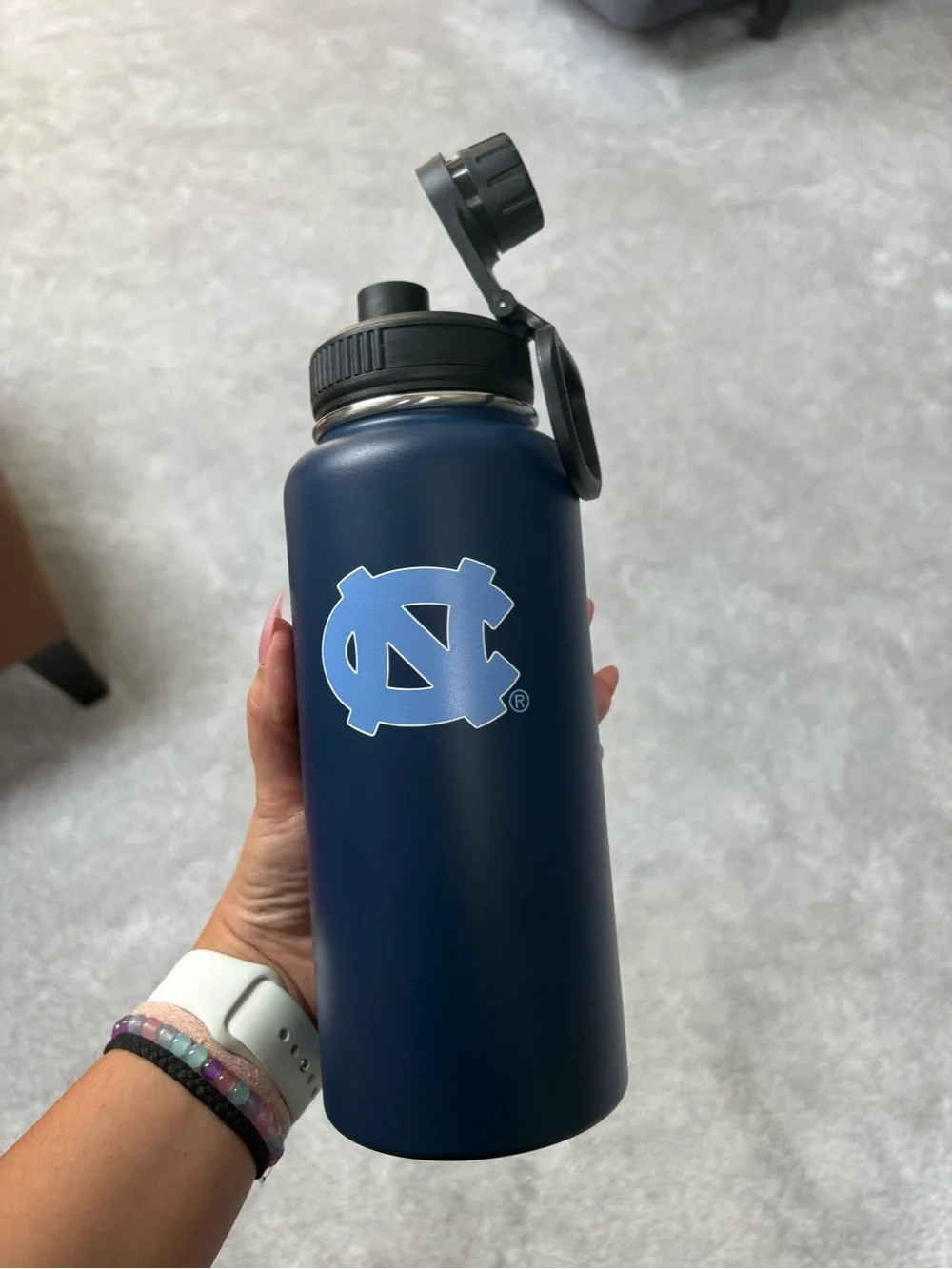 North Carolina Navy Stainless Steel Water Bottle with Light Blue Logo